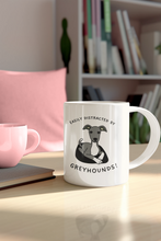 Load image into Gallery viewer, Easily Distracted By Greyhounds Graphic - White glossy mug
